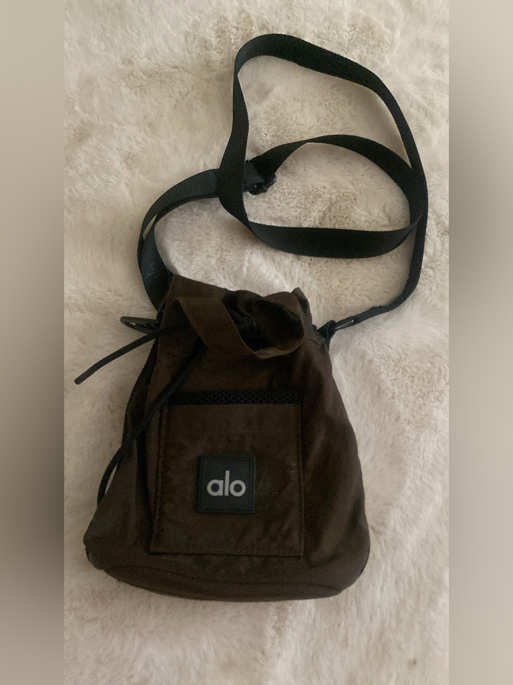 ALO Yoga woman Dark Brown Drawstring Crossbody Bag with Black Strap